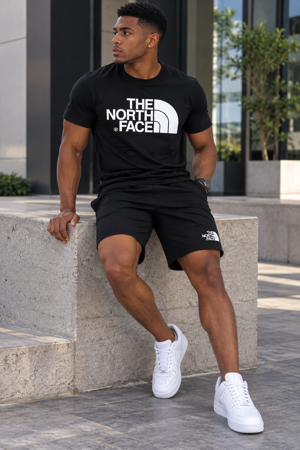 Conjunto corto para hombre en negro con estampados gráficos blancos en camiseta y short